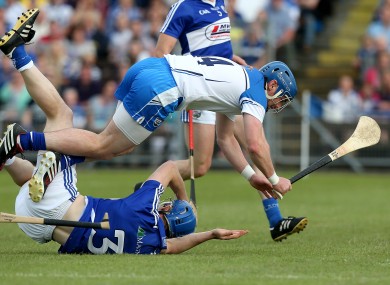 Waterford's Shane Walsh with Brian Campion of Laois.