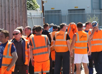 Greyhound staff outside the plant in Clondalkin earlier this week.