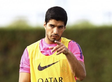 Barcelona forward Luis Suarez this morning.