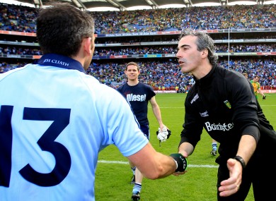 Jim McGuinness congratulates Alan Brogan after the 2011 semi-final between Donegal and Dublin.