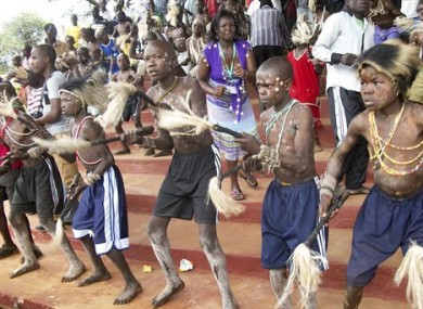 Boys from the Bukusu ethnic group, which prefers traditional circumcision using simple tools and no anesthesia, attend a circumcision ceremony in Bungoma, western Kenya.