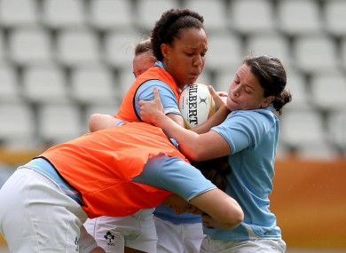 Sophie Spence takes contact from Jackie Shiels in yesterday's session.