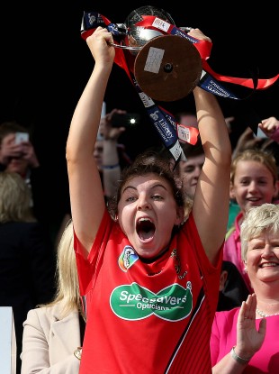 Niamh Mallon lifts the cup.