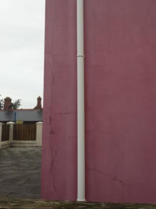 Photos of cracks outside a building in Carndonagh