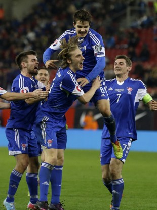 Faroe Islands players celebrate their opening goal against Greece.