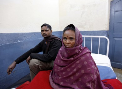 File photo. A patient recuperates on a hospital bed after undergoing a free sterilization procedure at the Mohan Lal Gautam District Women's Hospital in Aligarh, India.