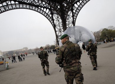 French soldiers patrol at the Eiffel Tower earlier this month.