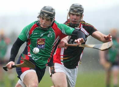 Alan Dempsey of Limerick gets away from James Gannon of IT Carlow