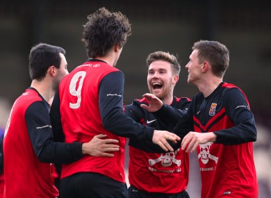 Calvin O'Callaghan celebrates scoring UCC's first goal.
