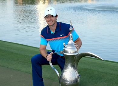 Rory McIlroy celebrates with the Dubai Desert Classic.