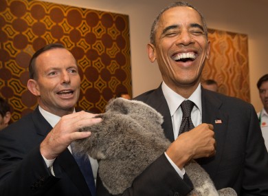 Australia's Prime Minister Tony Abbott and United States' President Barack Obama meet Jimbelung the koala ahead of the G20 summit last year.