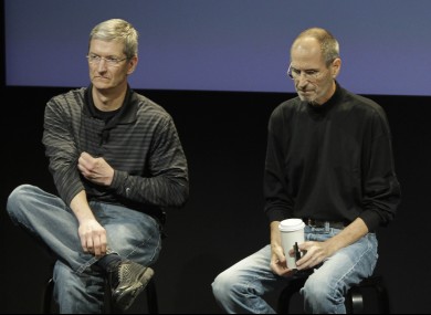 Apple's Tim Cook, left, and Steve Jobs, in 2010.