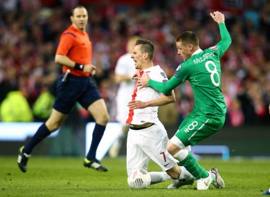James McCarthy and Arkadiusz Milik of Poland last night.