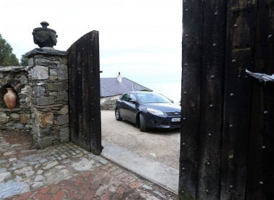 The gates opening at Gorse Hill as Brian O'Donnell leaves for court.