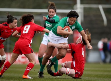 Sophie Spence drives through the Wales' defence.