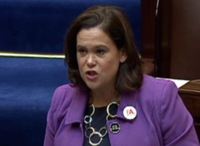 Mary Lou McDonald sporting a badge promoting a Yes vote in the Dáil today.