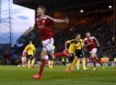 Swindon Town's Michael Smith celebrates after he scores his second.