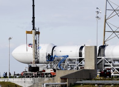 File Photo: Maintenance work being performed on a Falcon 9 SpaceX rocket earlier this year