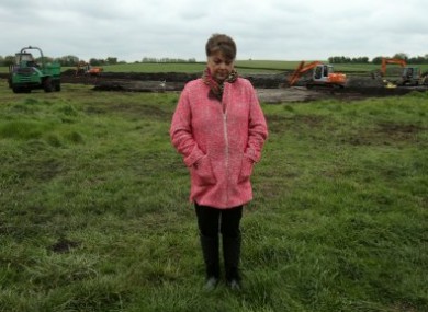 Maria Lynskey on farmland in Coghalstown where it's believed the body of her uncle is buried.