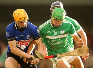 Eanna Martin (left) in action for Sarsfields against Kilmallock in last year's Munster club hurling semi-final.