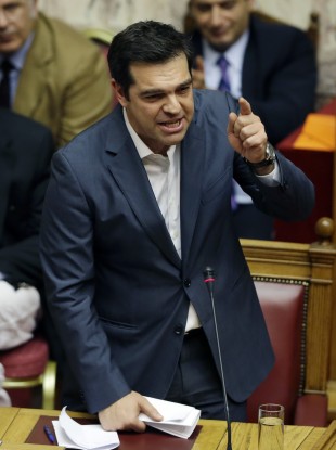 Greece's Prime Minister Alexis Tsipras delivers a speech during a parliament meeting in Athens.