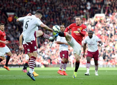 Man United captain Wayne Rooney and Villa's Irish defender Ciaran Clark.