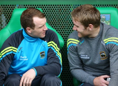McGrath, right, chats to Lar Corbett on the bench during the Munster SHC semi-final. McGrath is