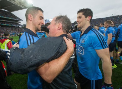 James McCarthy celebrates Dublin's win with Jim Gavin and Rory O'Carroll.