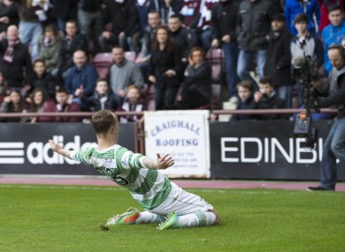 Celtic's Leigh Griffiths celebrates in front of Hearts fans after scoring at Tynecastle in February 2014.