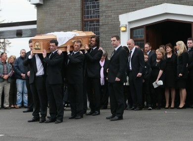 Jim Carrey helps carry the coffin of ex-girlfriend Cathriona White to Our Lady of Fatima Church, in her home village of Cappawhite, Co Tipperary.
