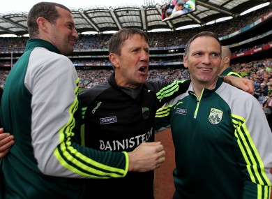 Jack O'Connor celebrates All-Ireland minor football success with his backroom team.