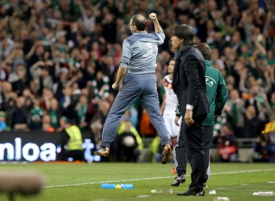 O'Neill jumps into the air as Shane Long scores the winner.