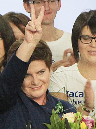 Conservative Law and Justice candidate for the Prime Minister Beata Szydlo celebrates