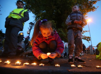 A vigil is held in the days after the Carrickmines tragedy.