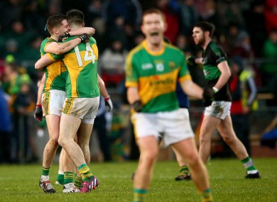 Fergal Condon and Michael Quinlivan celebrate at the final whistle.