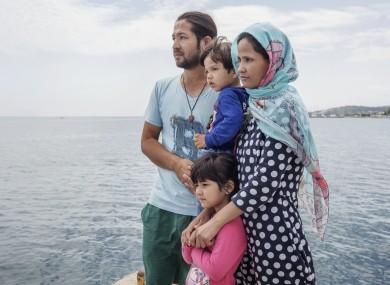 An Afghan family at the pier on the island of Kos. “I’ve come to Europe to give my children the best.”
