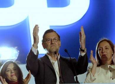 Popular Party leader and current Prime Minister Mariano Rajoy greets supporters.
