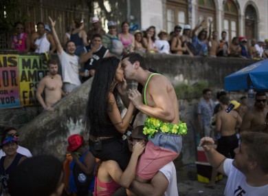 A couple kisses during the