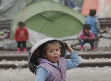 A girl from a migrant family in Idomeni, Greece, yesterday.