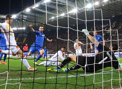 Spain's Aritz Aduriz, centre, scores past Italy goalkeeper Gianluigi Buffon.
