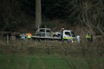A burnt out car is removed from the scene at Ravensdale Park in March 2012