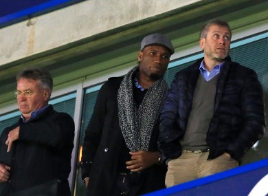 Drogba with interim Chelsea boss Guus Hiddink and owner Roman Abramovich.