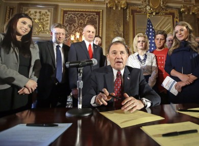 Governor Gary Herbert of Utah signs the state resolution.