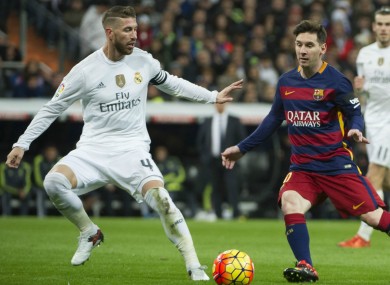 Sergio Ramos attempts to stop Lionel Messi