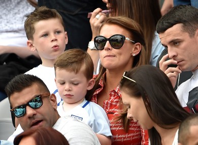 Coleen Rooney and her two older sons, Kai and Klay, at a match earlier this month.