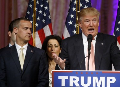 Corey Lewandowski stands alongside Trump at an election night event in Florida in March.