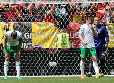 John O'Shea dejected after another Belgium goal.