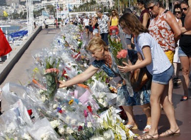 Flowers being placed on the Promenade des Anglais in Nice
