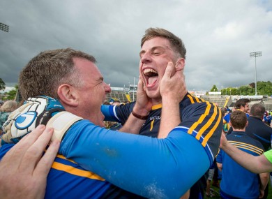 Tipperary manager Liam Kearns celebrates with goalkeeper Evan Comerford.