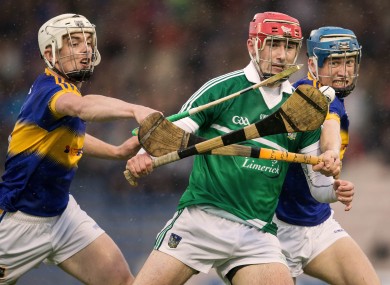 Limerick's Barry Nash in action against Tipperary's Ronan Maher.